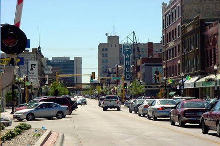 Fargo-ND Buildings with busy street and cars