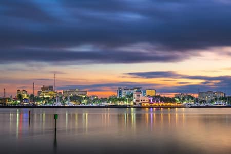 Bradenton,,Florida,,Usa,Downtown,Cityscape,On,The,Manatee,River,At Downtown Bradenton FL cityscape along Manatee River at dusk
