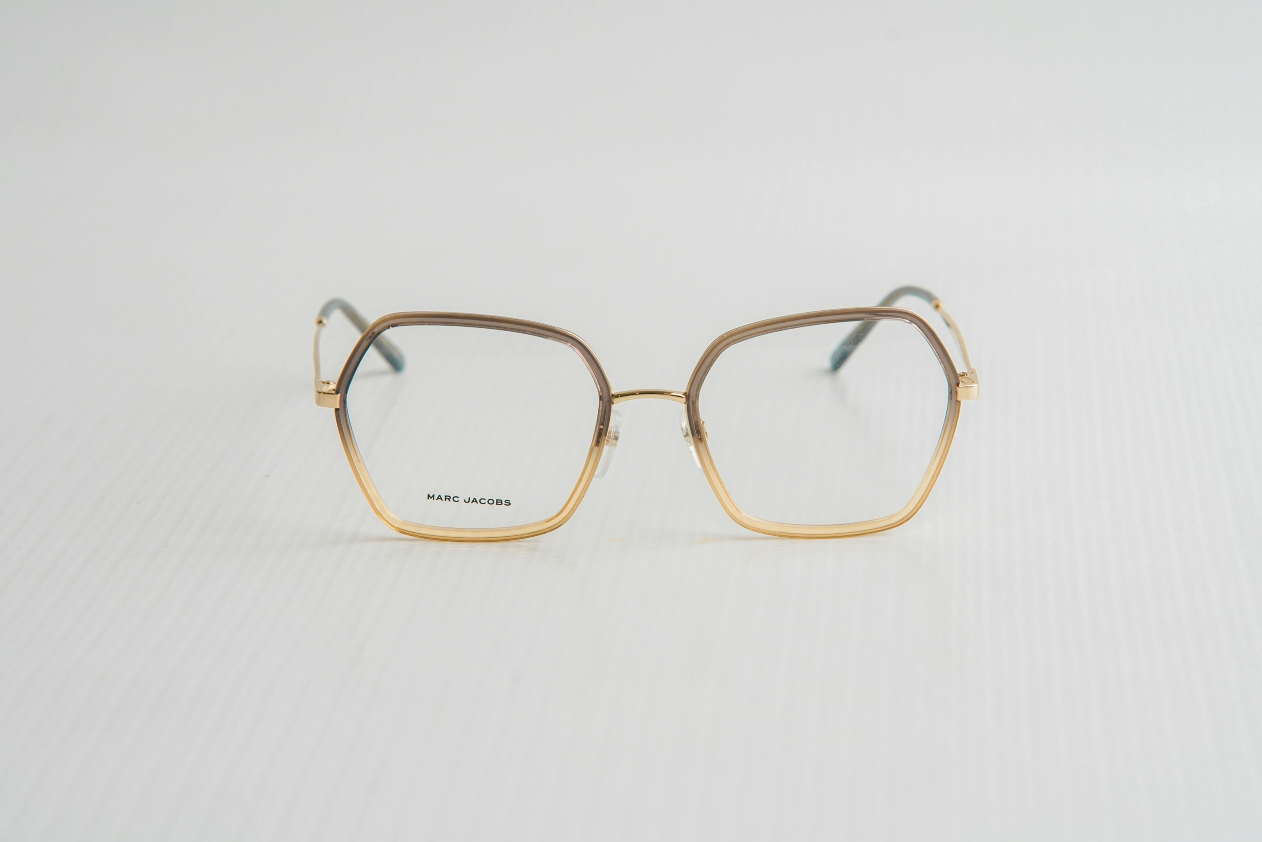 marc jacobs MJ 1060 frame marc jacobs MJ 1060 geometric frames that feature a "rimless" look