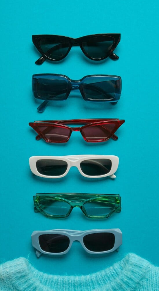 array of sunglasses an array of different brands of eyewear that All American Eyeglass Repairs work on