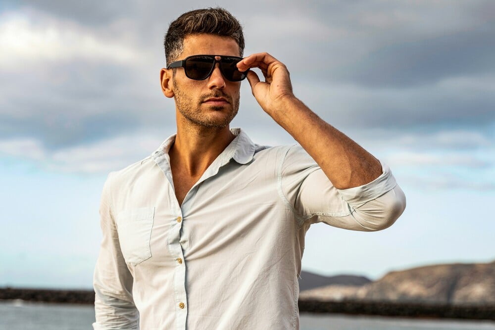 men's eyewear man wearing black sunglasses
