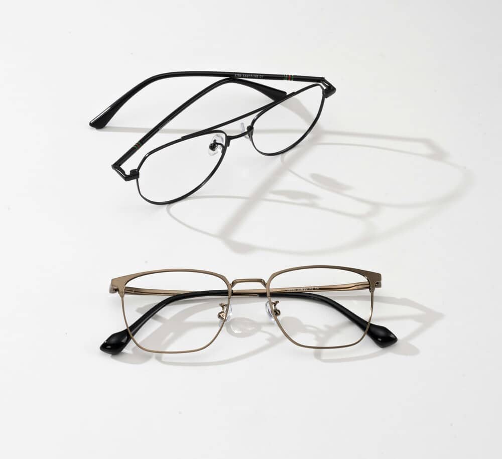 titanium frame repair Two pairs of modern metal glasses frames showcasing professional titanium eyeglass frame repair options